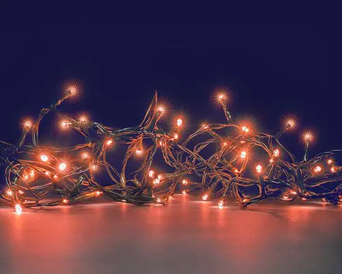 Guirlande lumineuse à 400 LED cuivre sur câble vert avec timer Flicker Light® Compact - 9 m